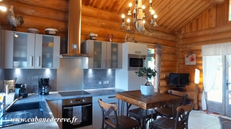 Image hebergement insolite CHALET-CABANE EN RONDINS AVEC SPA ET CUISINE D'ETE